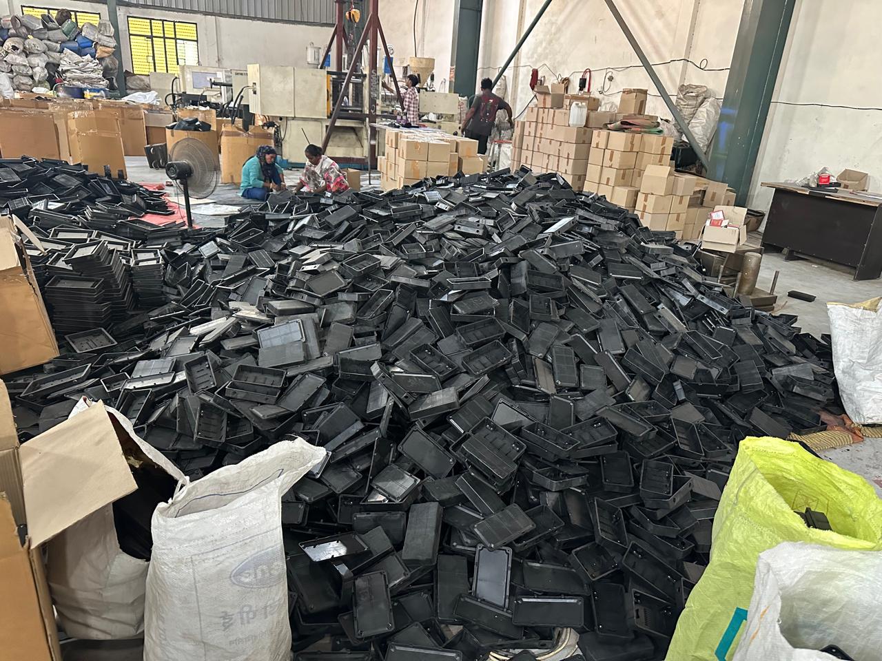 Wide view of the production floor with finished components staged for dispatch